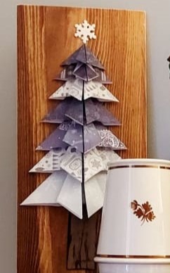 Blue and white folded paper Christmas tree.
