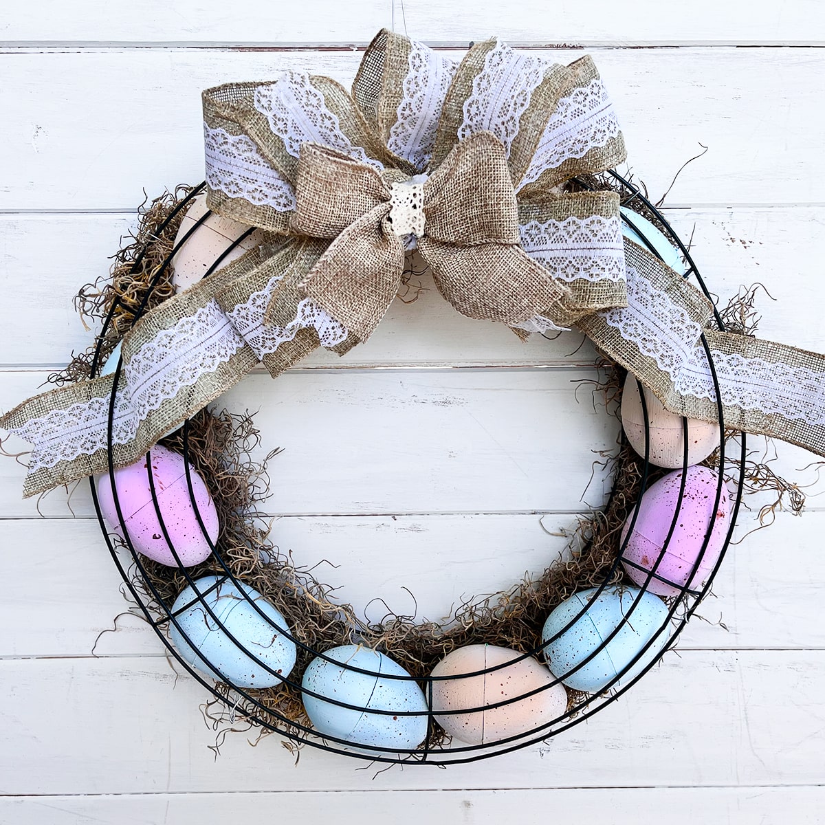 colored eggs with brown bow Wreath