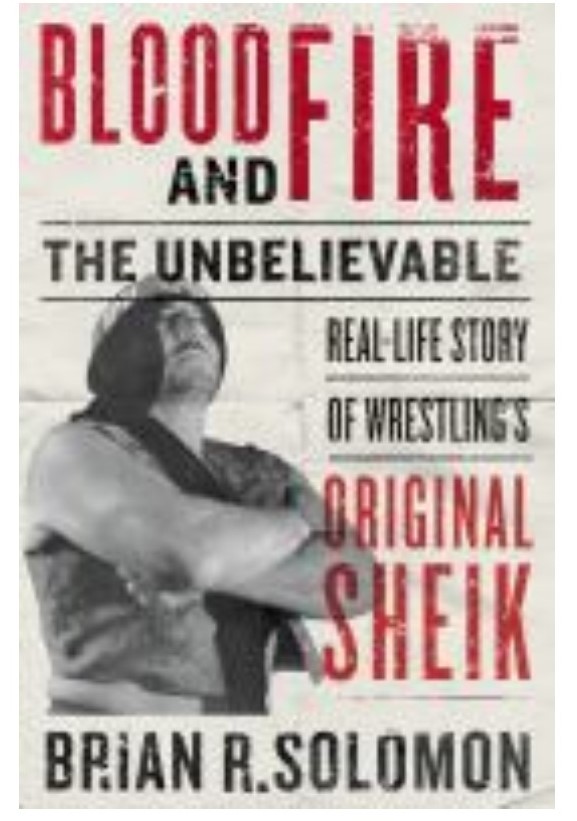 white book cover with red writing and picture of a wrestler