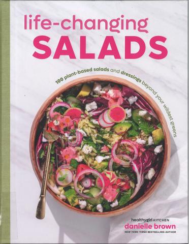 cookbook cover with colorful salad on front