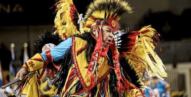Native American dancer in colorful costume
