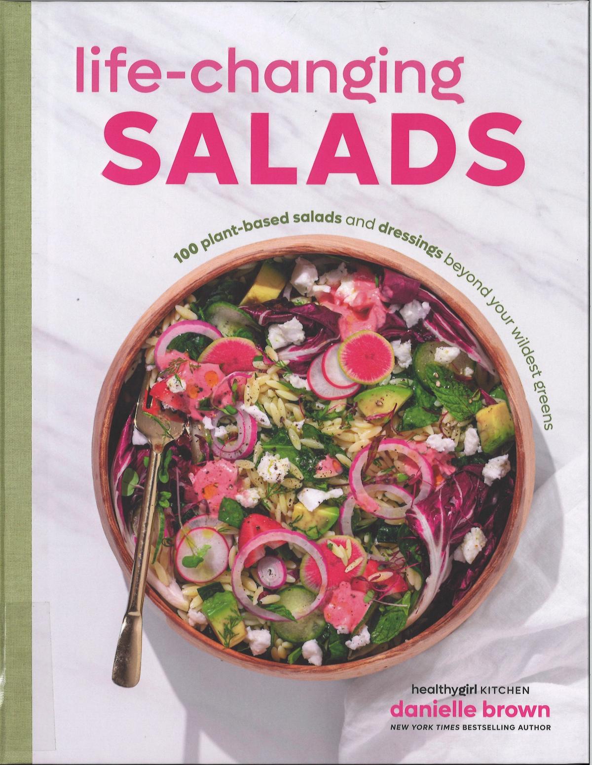 cookbook cover with colorful salad on front