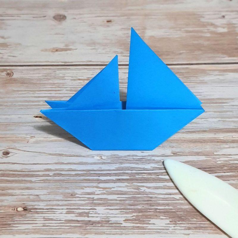 blue origami boat