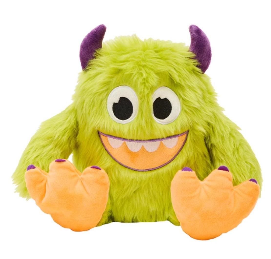 green monster with purple horns on head